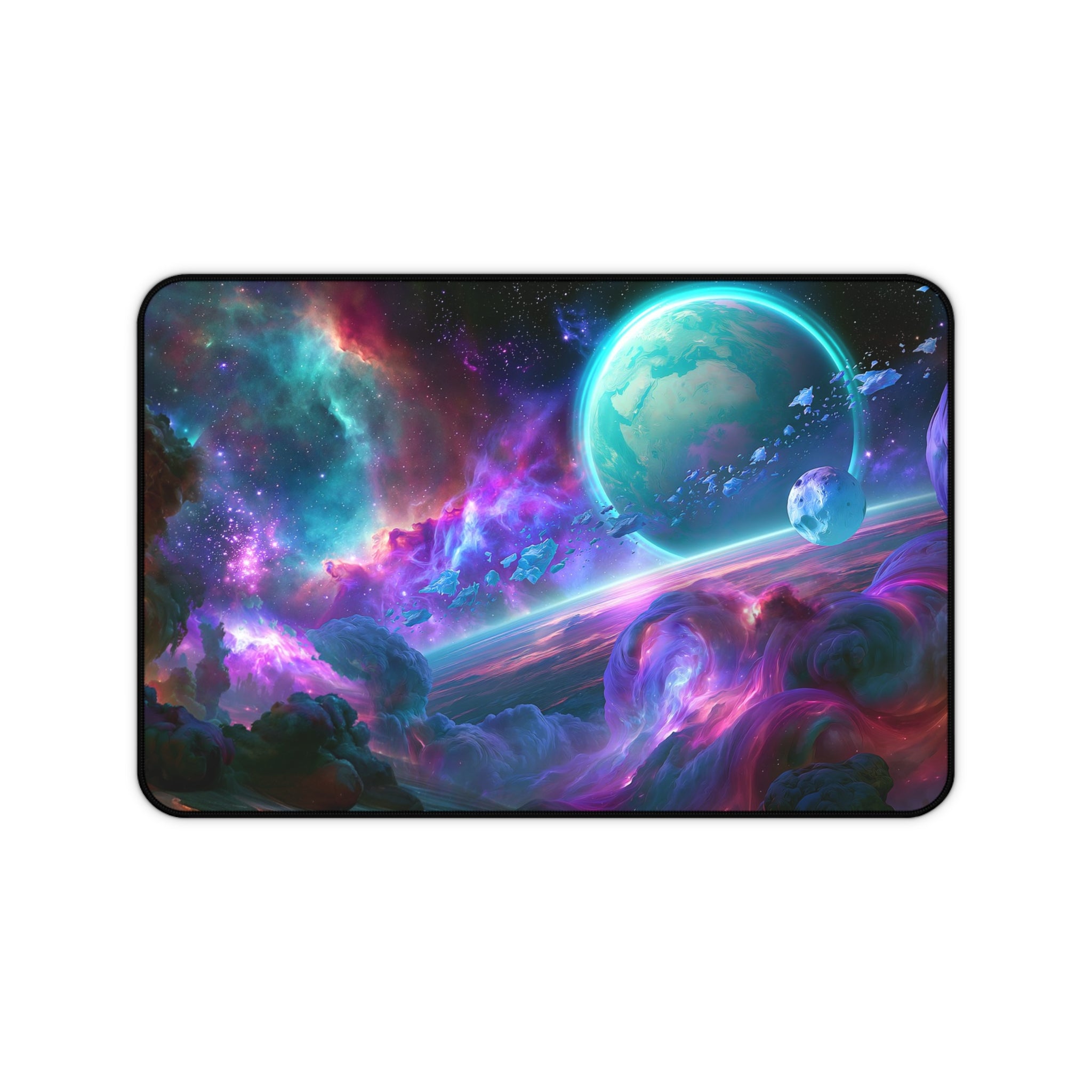 Ringfall deskmat — ringed planet rising through a teal and violet nebula, printed edge to edge on a neoprene desk mat