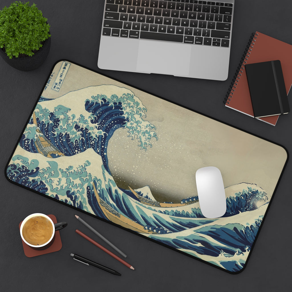 The Great Wave deskmat — Hokusai's ukiyo-e wave in ink and cream, printed edge to edge on a neoprene desk mat