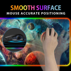 Hand using a mouse on the Exoplanets RGB deskmat, with a close-up inset of the mouse surface.