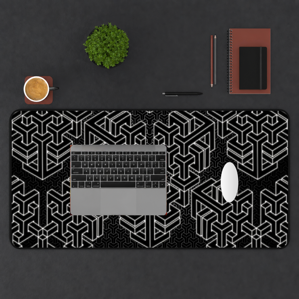 Vertices printed mat in a top-down workspace.